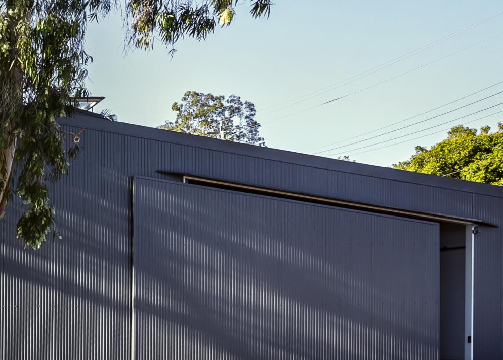 House with PANELRIB steel walling manufactured from COLORBOND steel in colour Basalt