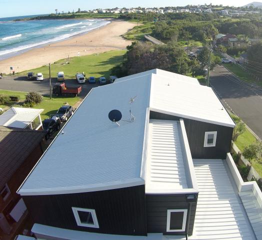 A photo of a home with a LYSAGHT® roof, built overlooking the ocean