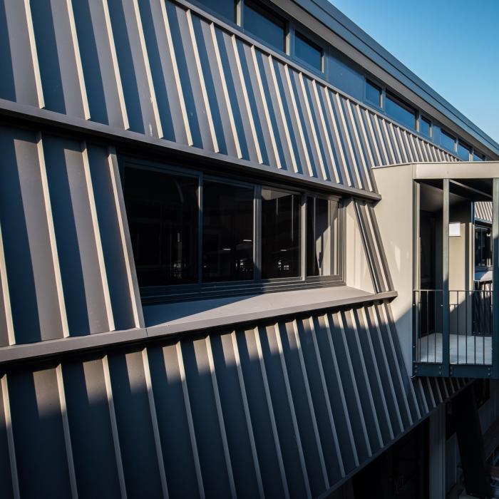 School building with ENSEAM steel walling manufactured from COLORBOND steel in colour Monument