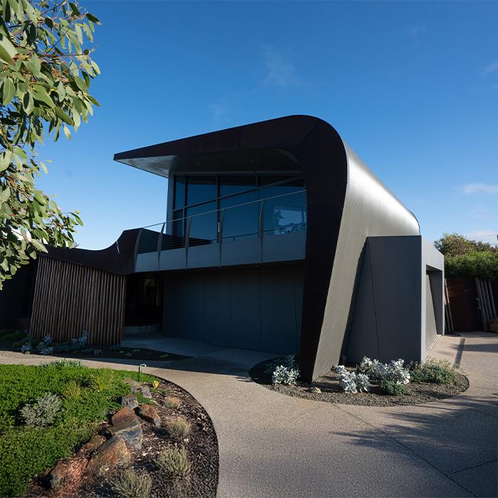 Marine-grade PERMALITE® aluminium roofing on a stylish coastal retreat.